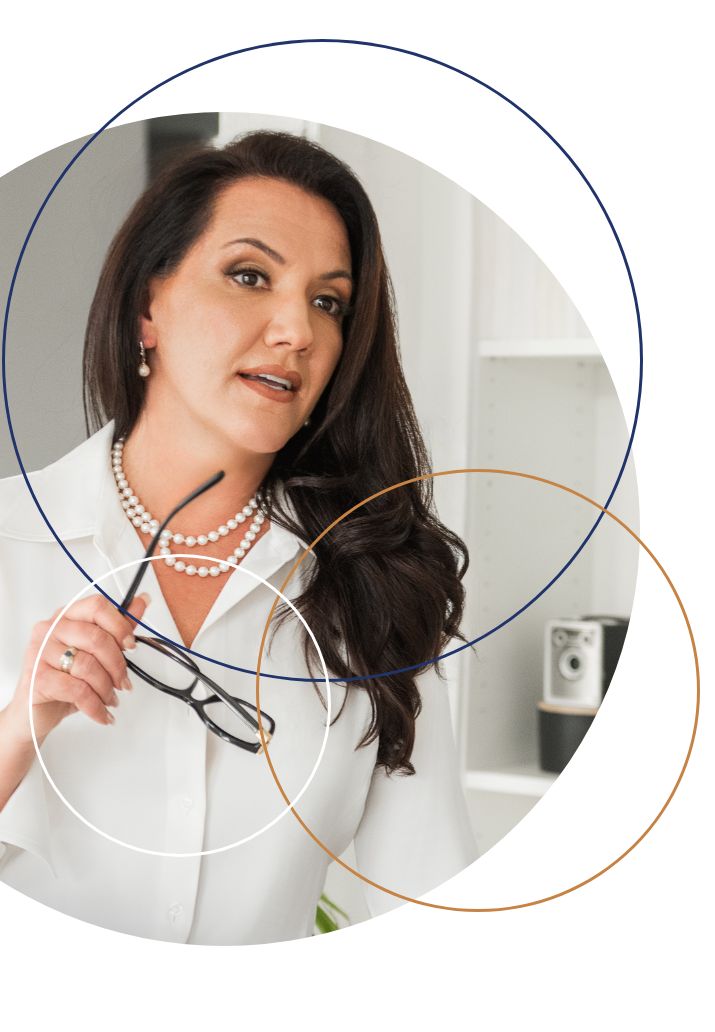 Professional real estate agent holding glasses